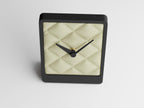Front-angle close-up of the Quiltmere table clock and diamond-quilt face