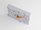Front-angle close-up of the Stonewake table clock and chiseled stone-look face