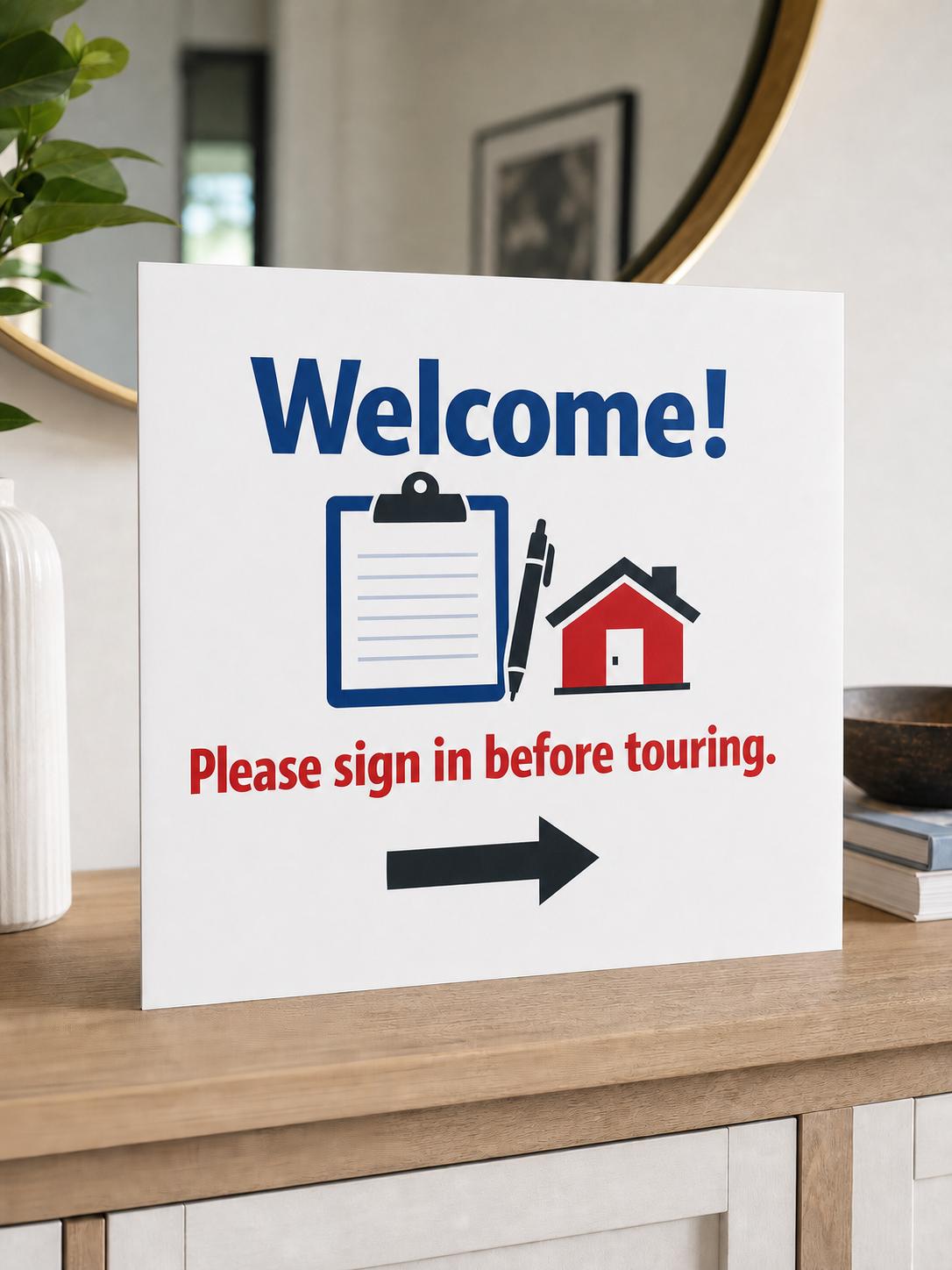 WelcomeRoute multicolor open-house sign-in sign upright on a bright entry console, shown close up with a right arrow.