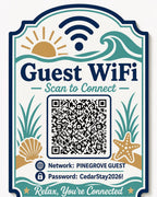 Coastal Current Guest WiFi Sign textured multicolor sign shown close up against a plain warm white background in navy, seafoam, sand, and cream with a complete QR code and sample guest network details.
