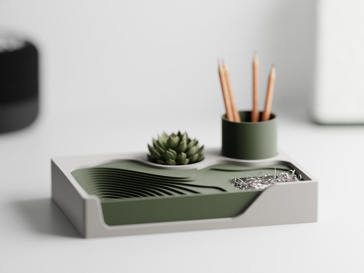 TerraceHub organizer in Woodland Ivory, with Ivory White frame and Dark Green landscape and pen cup on a desk.