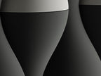 Macro close-up of the charcoal and ivory HaloWeave rounded relief surface