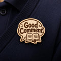 Brave Voice Good Comment engraved birch reward badge shown close up in a realistic meeting setting.