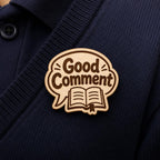 Brave Voice Good Comment engraved birch reward badge shown close up in a realistic meeting setting.