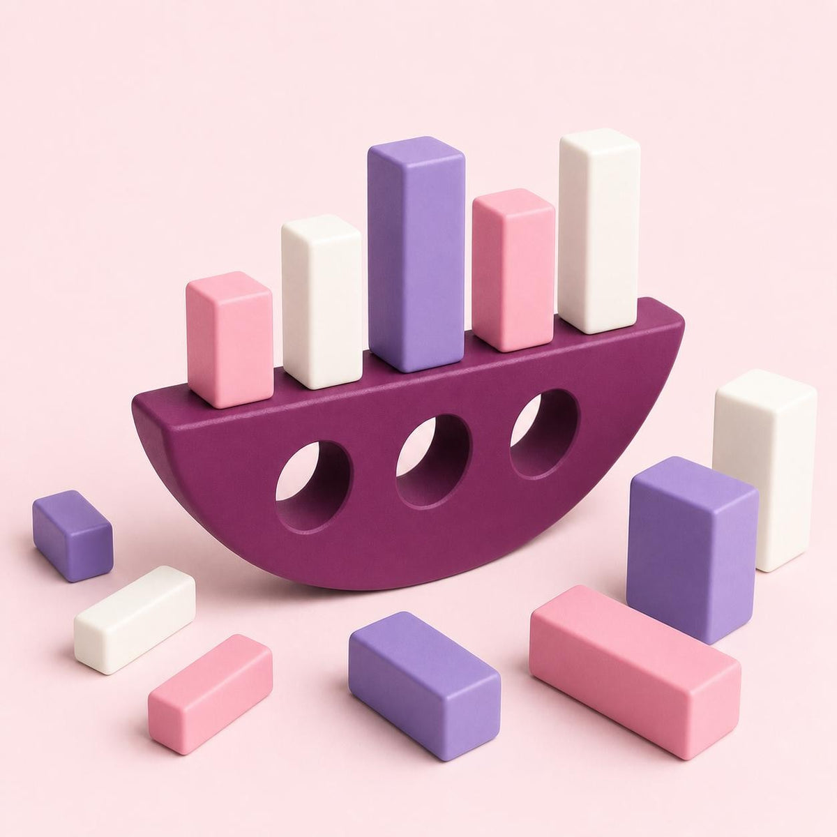 Candy Shift ArcTumble gravity stack game with a plum rocker and twelve pink, lilac, and ivory blocks on a pale blush background