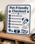 PawStay navy and cream pet-friendly checkout sign upright on a vacation-rental mudroom console in a close-up view.