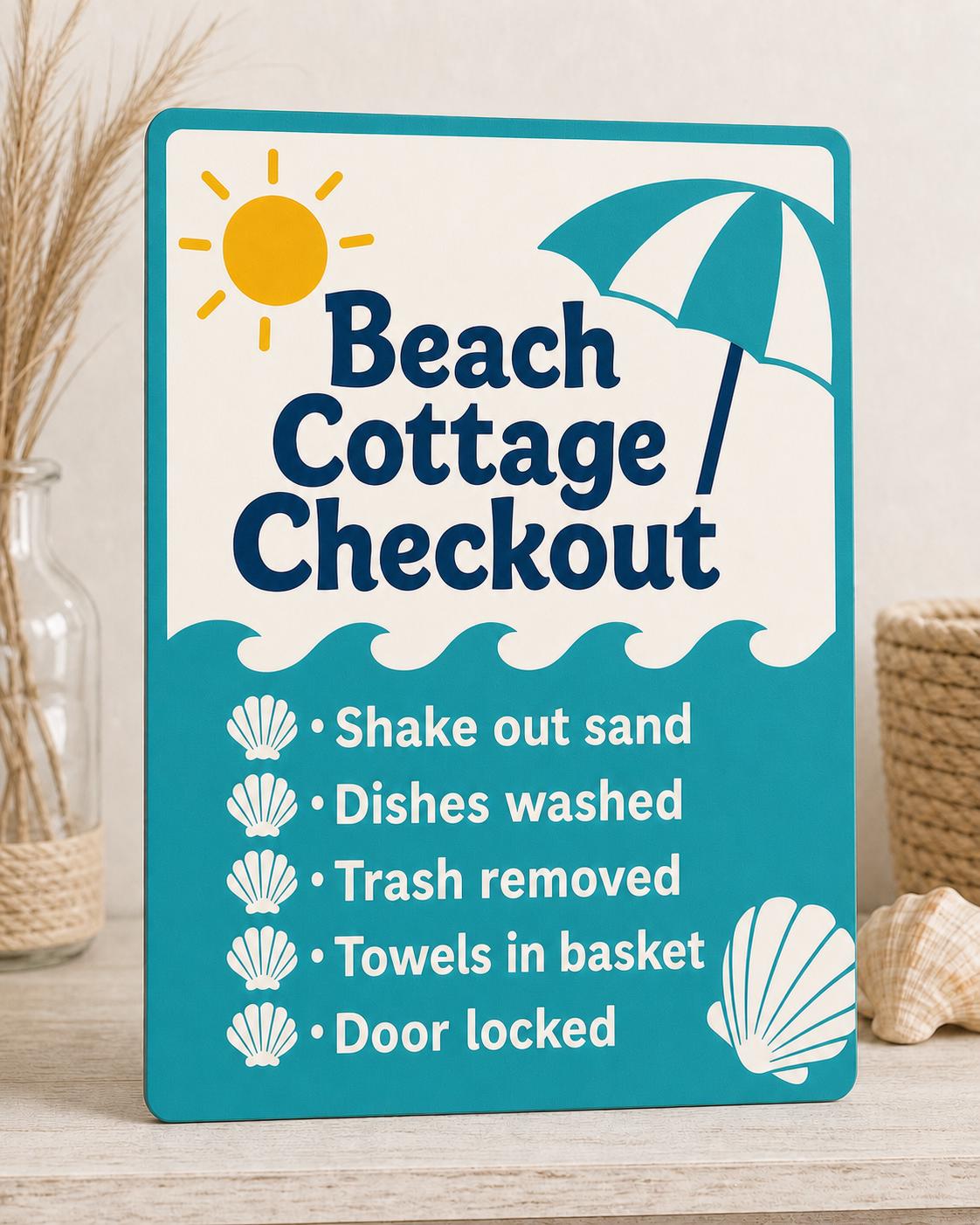 Sunwave turquoise and navy beach cottage checkout sign upright on a bright coastal console in a close-up view.