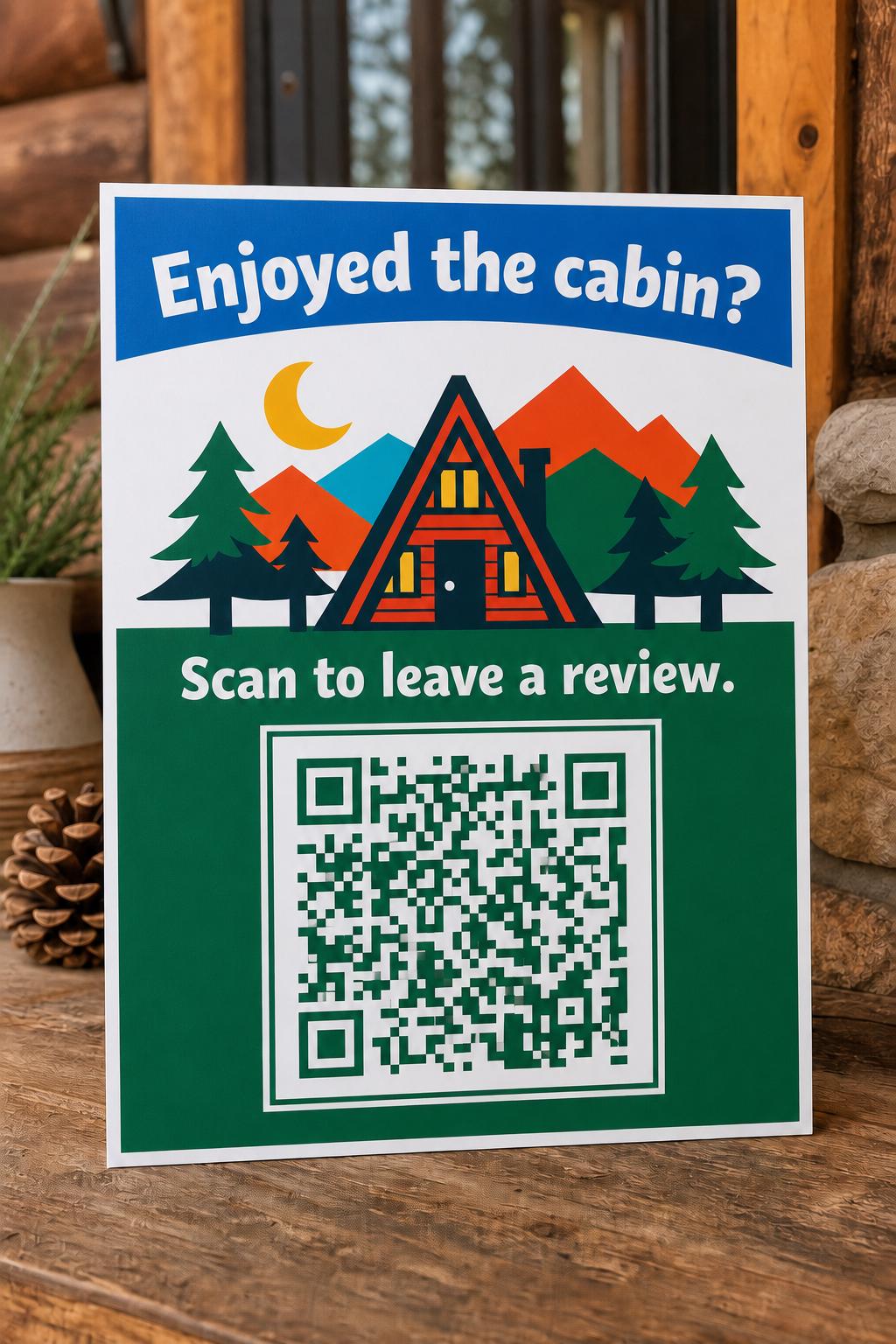 A-Frame Haven multicolor cabin guest review sign upright on a mountain-rental console with a finished sample QR code.