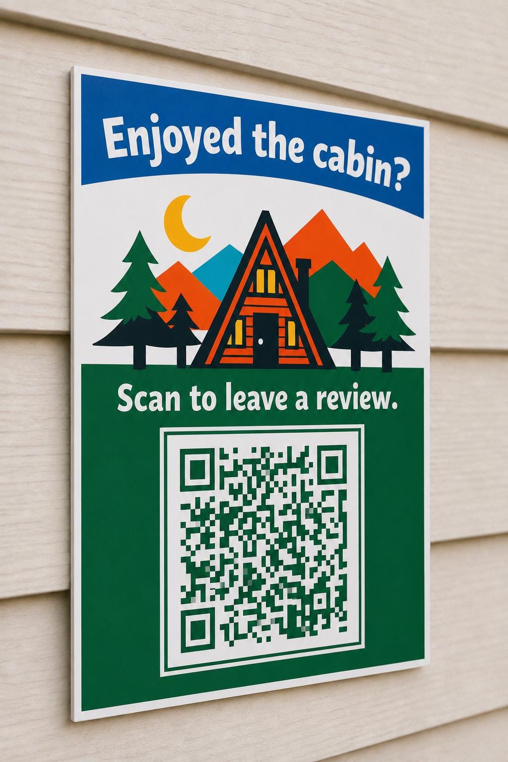 A-Frame Haven multicolor cabin review sign mounted on a neutral wall from a close side angle with a finished sample QR code.