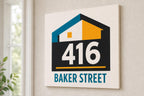 AddressMark colorful house-number sign mounted on a neutral entry wall from a close side angle.
