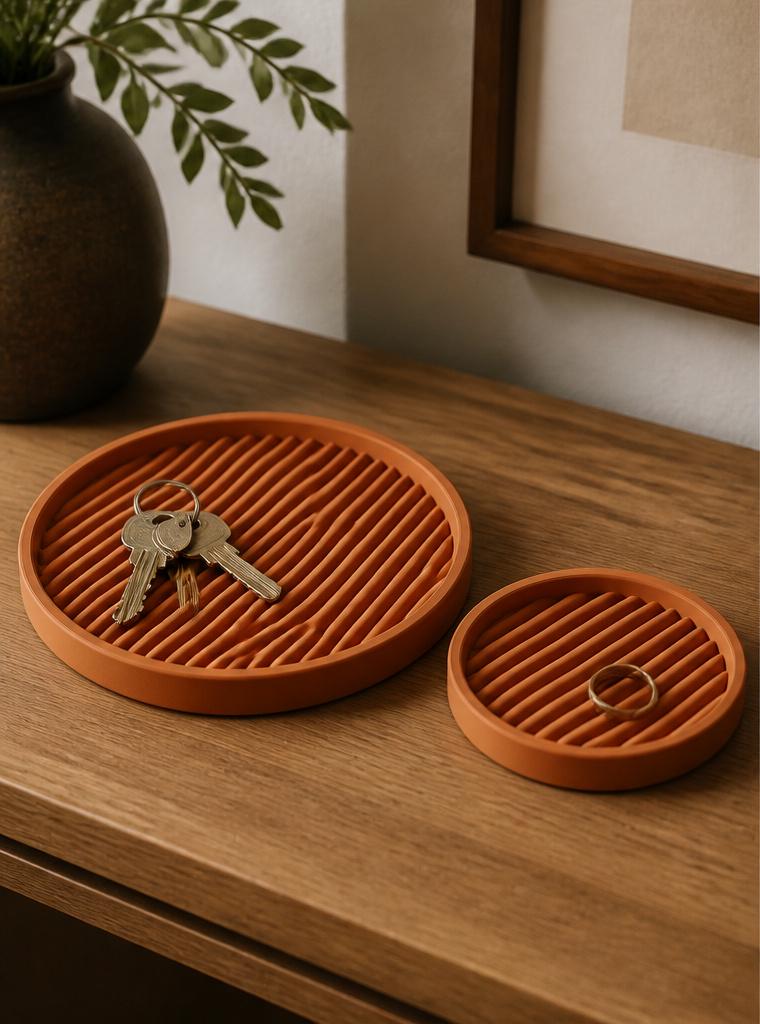 Watersong tray set in dark green, three-quarter close-up on an entryway console holding keys and jewelry.