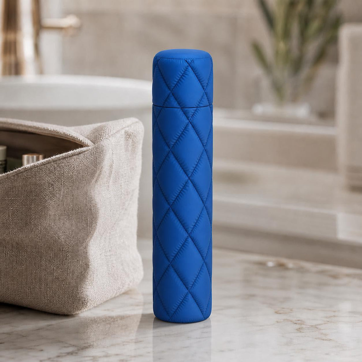 Wayfarer Quilt Case Collection, close-up of the complete tall Cloudquilt toothbrush travel case in Marine Blue