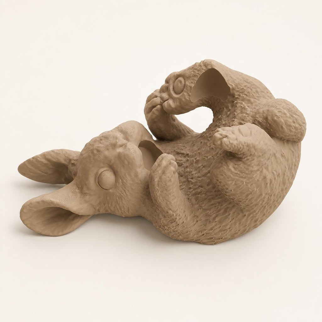 Meadowtip Bunny Bottle Stand, close-up Latte Brown reclining rabbit holder showing its empty bottle cradle