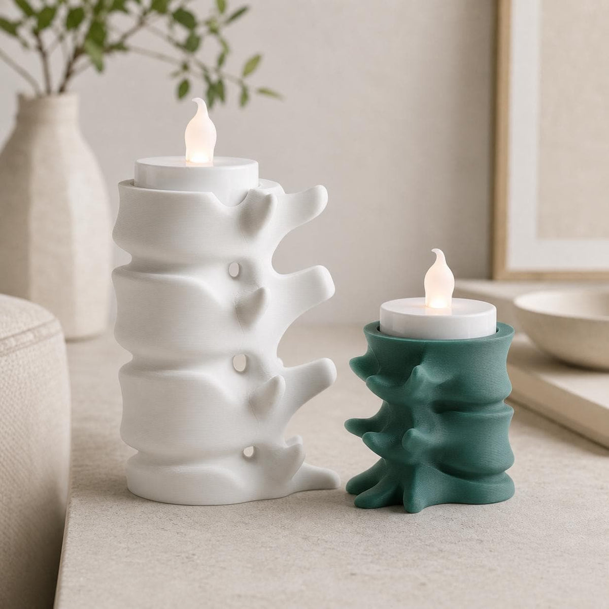 White tall and Mistletoe Green compact SpineGlow LED tealight holders shown side by side