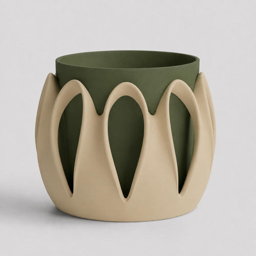 Arcloom planter in Woodland with Desert Tan outer arches and a Dark Green inner pot, viewed from a raised three-quarter angle on pale gray.