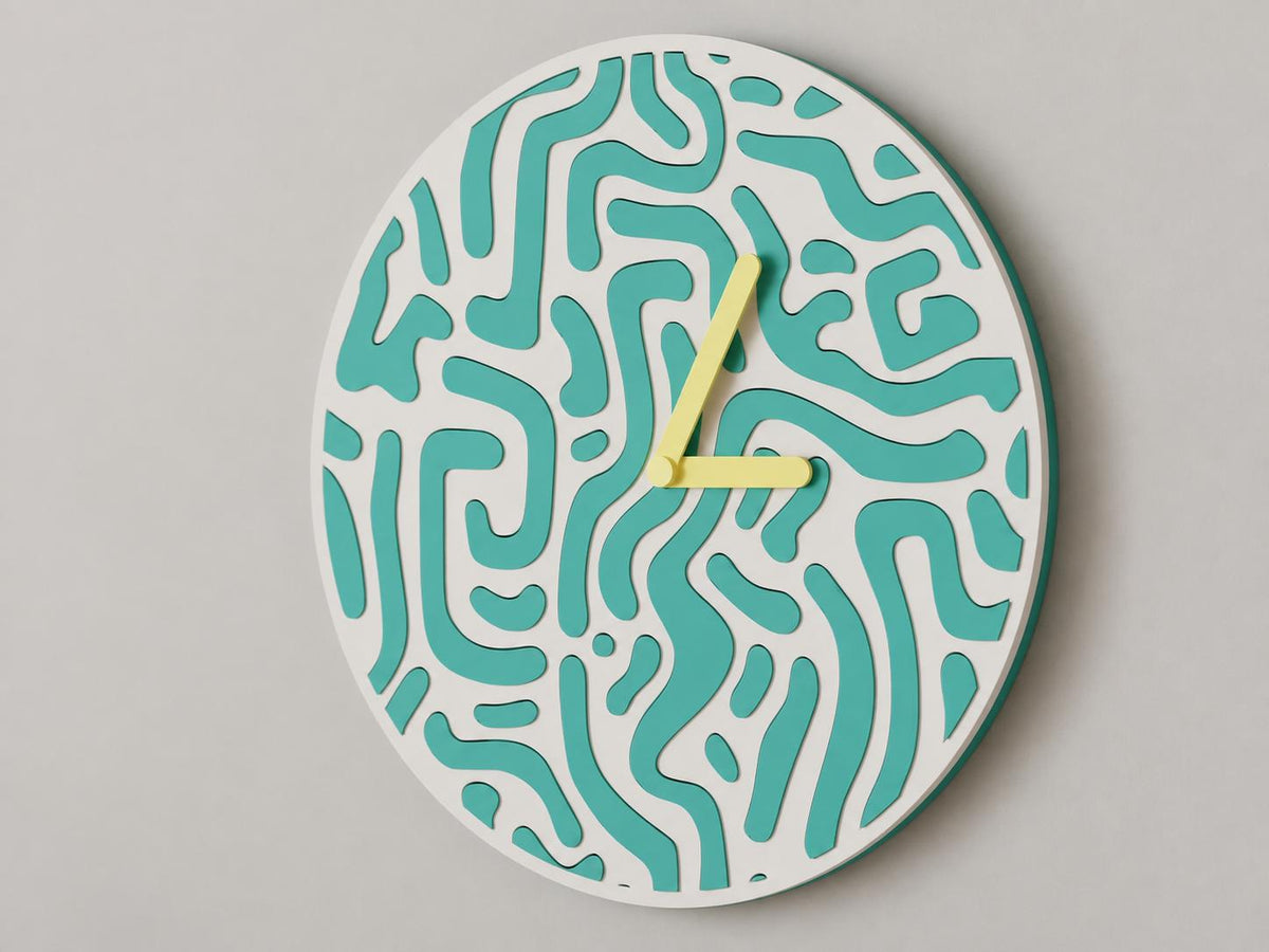 Flowmaze Wall Clock, turquoise and white organic pattern with yellow hands, close-up on a gray wall from the source photograph viewpoint.