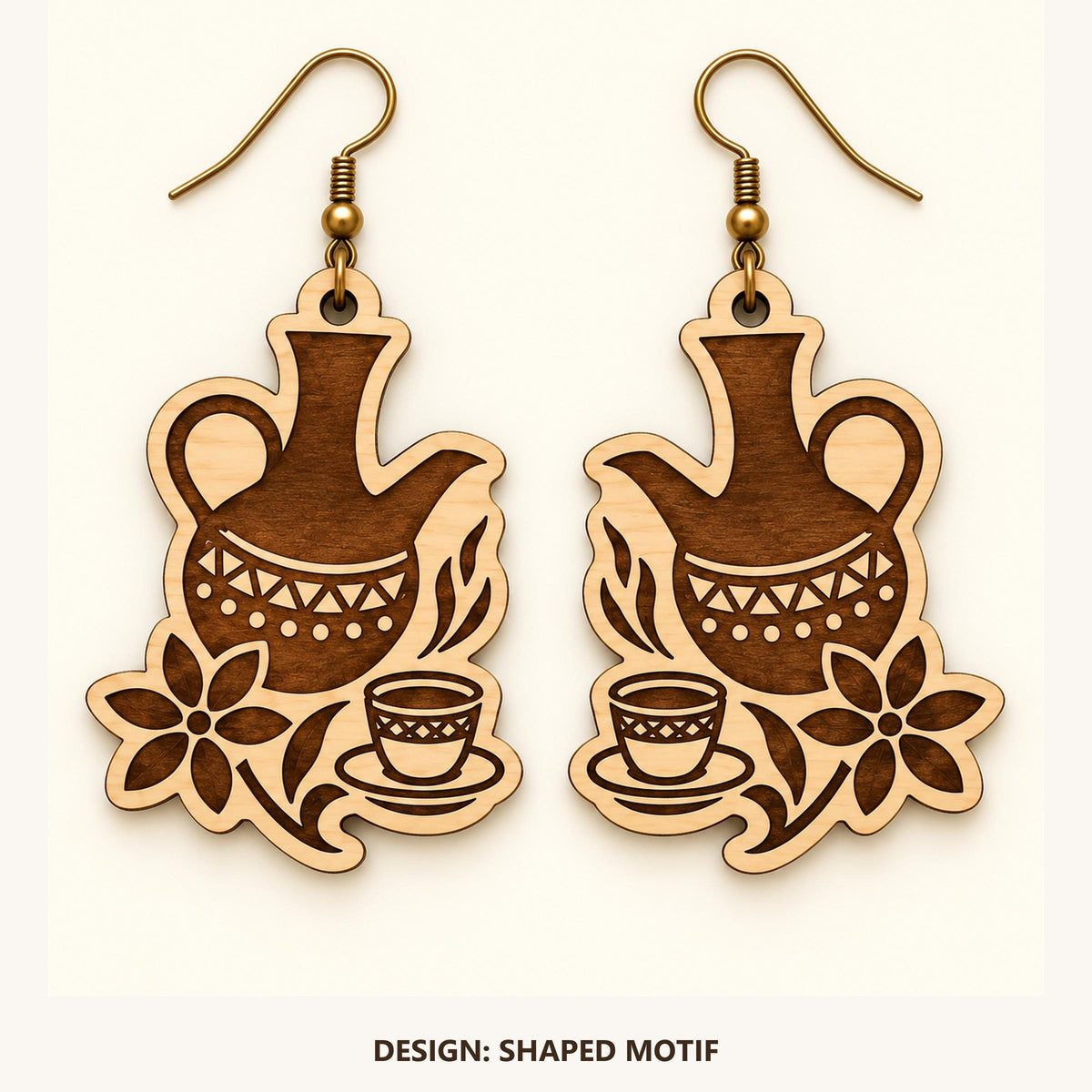 Front view of the Addis Ababa Shaped Motif engraved birch earring pair on a light background.