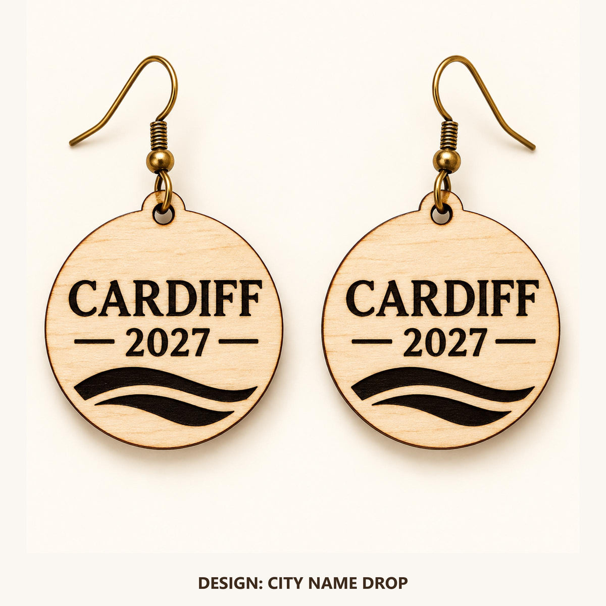 Front view of the Cardiff City Name Drop engraved birch earring pair on a light background.