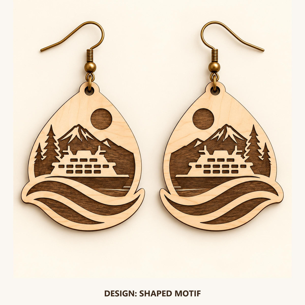 Front view of the Seattle Shaped Motif engraved birch earring pair on a light background.