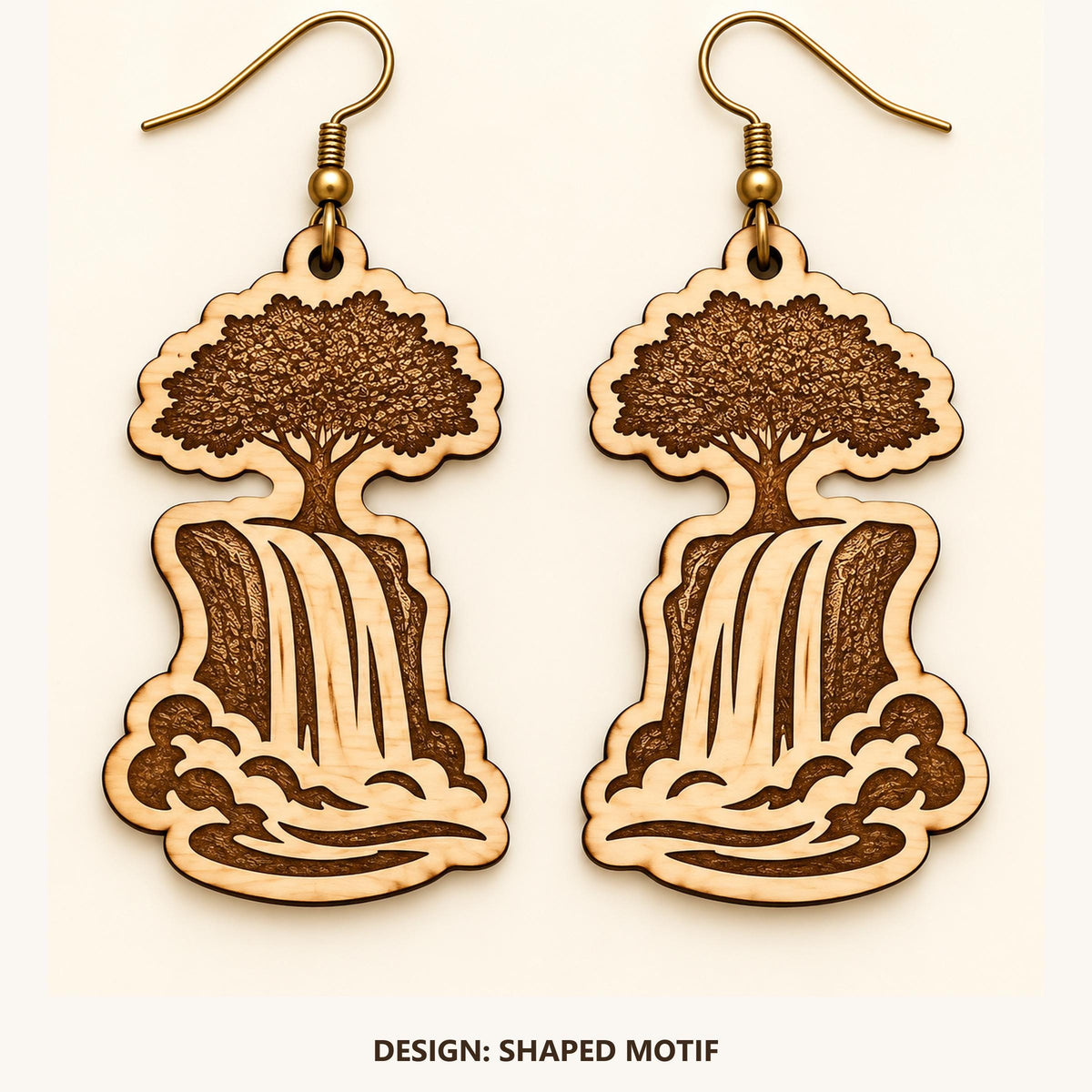 Front view of the Lusaka Shaped Motif engraved birch earring pair on a light background.