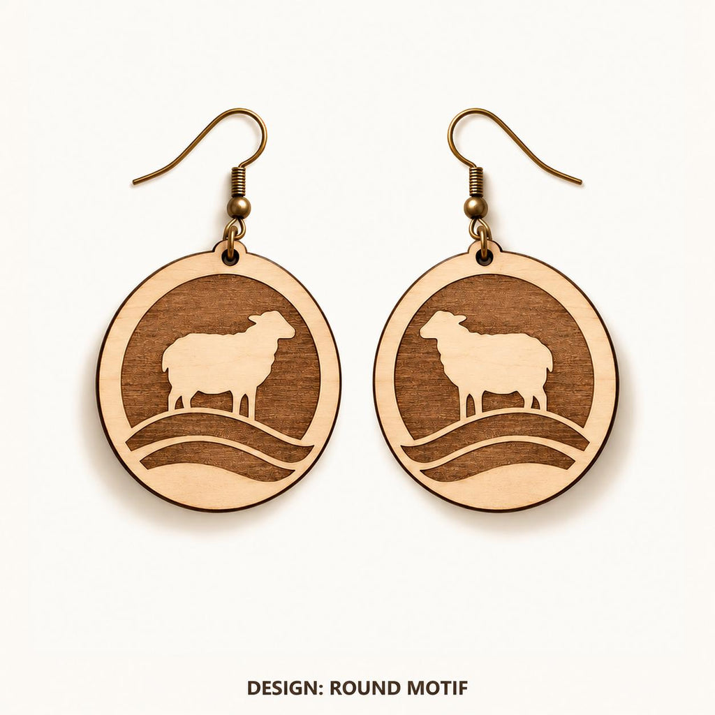 Front view of the Cardiff Round Motif engraved birch earring pair on a light background.