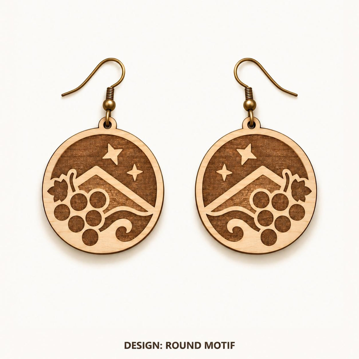 Front view of the Coquimbo Round Motif engraved birch earring pair on a light background.