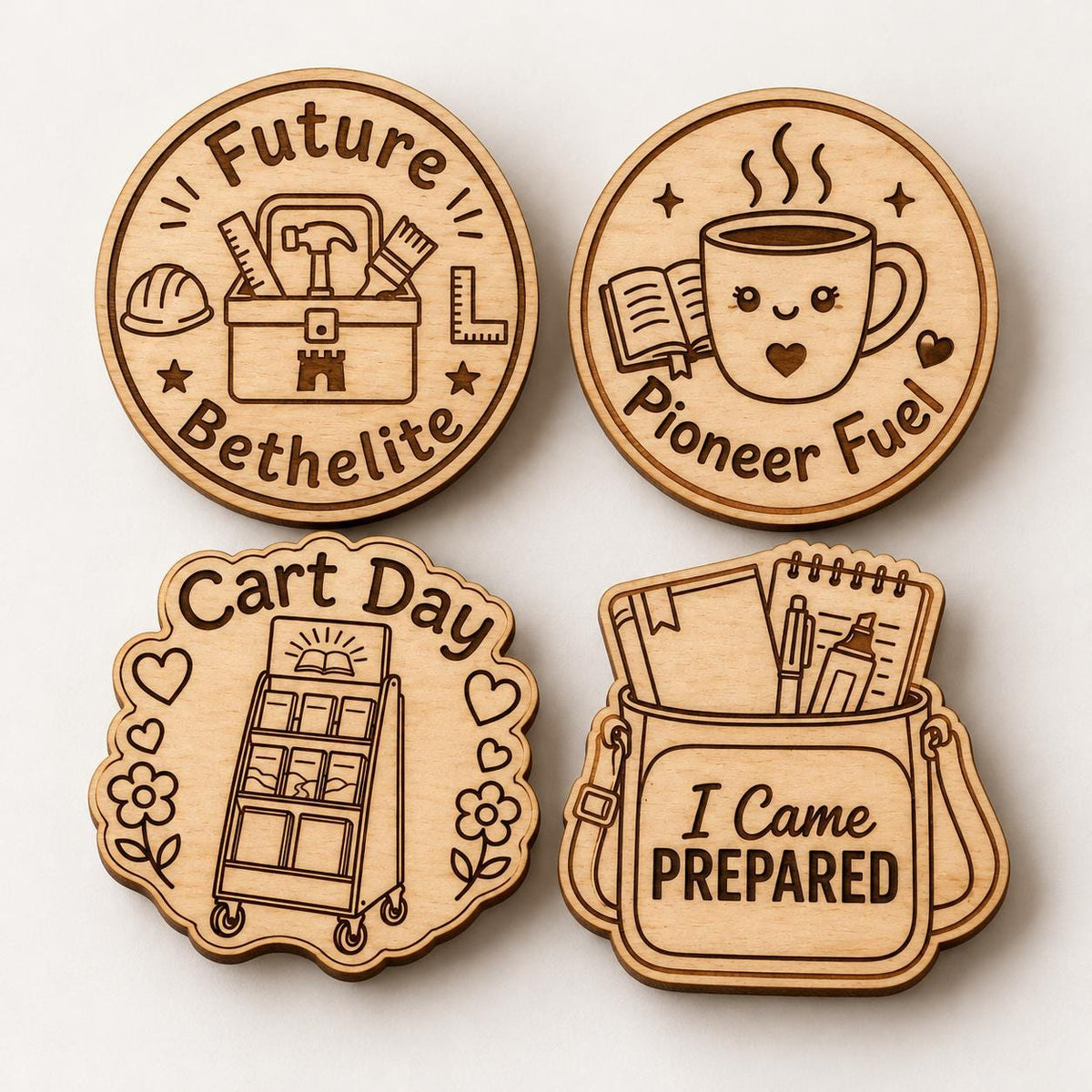 Four natural birch engraved accessory designs shown together on a plain light background.